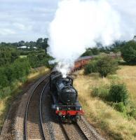Climbing away from Farington Curve Junction on 8 August, ex-LNER K4 no 61994 <I>The Great Marquess</I> hauls the 12 coach 'Fellsman' railtour round the long curve before heading east towards Blackburn and on to Carlisle.<br><br>[John McIntyre 08/08/2012]