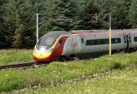 A southbound Pendolino at speed near Crawford on 25 July 2012.<br><br>[John Steven 25/07/2012]