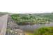 View north across the river Esk from Larpool viaduct on 30 May 2012. Whitby Abbey is just emerging from the haar on the hilltop in the centre background, while the former Whitby West Cliff station lies just out of sight beyond the far end of the viaduct. [See image 21088] <br><br>[Brian Taylor 30/05/2012]