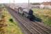 A V2 drifts  down the bank towards Saughton Junction in July 1959 with a train for Waverley.<br><br>[A Snapper (Courtesy Bruce McCartney) 25/07/1959]