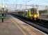 350.232 seems to have a smile on its face, courtesy of the setting sun, as it arrives at Milton Keynes Central with the 18.32 service to Birmingham New Street. <br><br>[Ken Strachan 29/03/2012]