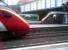 Three noses, three liveries, and some stalactites on the overbridge at the primary rail passenger hub of the Midlands. That white light on the side of the Voyager wasn't my flashgun, honest.<br><br>[Ken Strachan 20/06/2012]