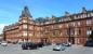 The Station and Station Hotel at Ayr, seen here on 1st June 2012. The impressive structure was built to the design of Andrew Galloway, Chief Engineer of the G&SWR, in 1886. The view from the platform side shows a less happy picture - boarded-up windows, small trees growing on the facade etc... [see image 39436]<br><br>[Colin Miller 01/06/2012]