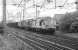 Iron ore from Hunterston Terminal to Ravenscraig Steelworks is hauled out of Mossend Yard by 37099, 37010 and 37210 on 7 June 1990.<br><br>[Bill Roberton 07/06/1990]