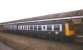 A DMU stands at Falmouth Docks station in August 1992 following arrival on a service from Truro.<br><br>[Ian Dinmore /08/1992]