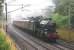 Whilst the weather in London on 25 July was reported as 30C and sunny it was a different story in the North West as <I>The Fellsman</I> set out once again in mist and rain. LMS 8F 2-8-0 48151 is running at its maximum permitted 50mph, just north of Barton and Broughton, with twelve coaches for another fully booked trip to Carlisle via the S&C. <br><br>[Mark Bartlett 25/07/2012]