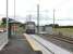 Looking towards Cleveleys and Blackpool from the level crossing at Broadwater as <I>Flexity</I> tram 009 departs for Starr Gate. The tram stop has been moved from the other side of the crossing during the refurbishment and now has staggered, level access platforms. [See image 39821] for the same location three years earlier.<br><br>[Mark Bartlett 31/07/2012]