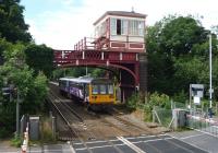 Unit 142016, forming a Carlisle - Newcastle service, departing from the Wylam stop on 7 August.<br><br>[John Steven 07/08/2012]