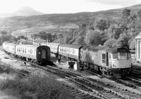 BRCW Type 2 5357 on a Fort William - Glasgow Queen Street working crossing a northbound service at Crianlarich in the summer of 1971. The train crews are in the process of swapping over.<br><br>[John Furnevel 29/06/1971]