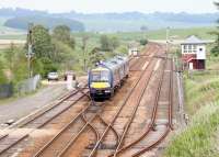 A northbound train passing Greenloaning loops and signal box in June 2005.<br><br>[John Furnevel 21/06/2005]
