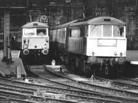 Trains for Manchester and London Euston stand at Glasgow Central in August 1981.<br><br>[John Furnevel 18/08/1981]