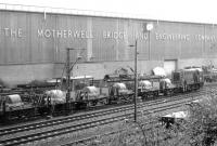 Shunting sidings alongside Motherwell Bridge and the WCML in October 1970. The Motherwell Bridge sidings were beyond the fence. [See image 56105]<br><br>[John Furnevel 30/10/1970]