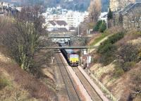 Southbound empties between Gorgie East and Craiglockhart on the Edinburgh sub in March 2002, seen here shortly after passing below Slateford Road.<br><br>[John Furnevel 03/03/2002]