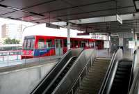 The DLR platforms at Canning Town in July 2005. Built above the original station, the escalators lead down to the North London line, Jubilee line, bus interchange and station exit.<br><br>[John Furnevel 22/07/2005]