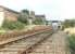 The 1860 station at Maxwelltown (closed 1939) looking east towards Dumfries in 1970. At this time the line was still open as far as the ICI Works at Cargenbridge and the old goods yard off picture to the left housed a rail served fuel distribution depot. Only the up line was in use and the former station house was unoccupied and secured.<br><br>[John Furnevel 07/02/1970]