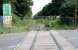 Scene at Alloa West level crossing looking east on 2 June 2005, with barriers erected and one or two site safety notices now in place.<br><br>[John Furnevel 02/06/2005]