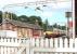 Looking east over the platforms at Cardross from the level crossing in July 2005, with a train for Airdrie about to depart.<br><br>[John Furnevel 27/07/2005]