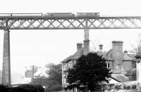 A type 2 pilots a type 4 on a southbound train coming off the Forth Bridge at South Queensferry in October 1982.<br><br>[John Furnevel 25/10/1982]