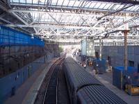 The 18.30 East Coast London Kings Cross Service loading prior to departure from Waverley on a sunny  23 August evening, with a preview of the forthcoming benefits from the renovated station roof.<br><br>[Andrew Wilson 23/08/2012]