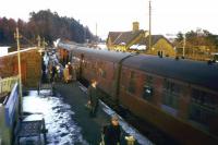 In late January and early February 1963, the Waverley Route was blocked by snow between Stobs and Steele Road stations for 18 days. This scene, featuring the 4.33 pm Carlisle-Edinburgh train, is further south at Newcastleton on Saturday 23rd February, during the subsequent 25 days of single-line operation before the line was fully re-opened between Steele Road and Stobs. One month later, the publication of the Beeching Report would effectively seal the Waverley Route's fate.<br><br>[Frank Spaven Collection (Courtesy David Spaven) 23/02/1963]
