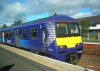 320308 stands in the sunshine at Lanark station on 19 September 2012.<br><br>[John Yellowlees 19/09/2012]