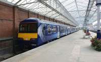 Waiting for work. A pair of Class 320 EMUs in ScotRail blue, stabled in platform 3 (onetime platform 4) at Helensburgh Central on 23 September 2012.<br><br>[John McIntyre 23/09/2012]