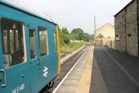 Looking east from Leyburn station in August 2012. Class 117 DMS W51400 was on this occasion paired with a Metro-Cammel unit to form a two car set. [See image 27817] for the same location in 1982, since when the track layout has been greatly simplified. <br><br>[Mark Bartlett 11/08/2012]