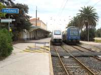 Scene at Hyeres, just to the east of Toulon, standing at the end of a 10km single line branch from the main Marseille to Nice line. The train on the left is the 10:11 TGV to Paris, due to arrive in Paris at 14:56.  Not bad for a journey in excess of 850km. On the right is the 10:31 stopper to Marseille via Toulon consisting of a pair of 2-car double deck units. <br><br>[Malcolm Chattwood 29/09/2012]