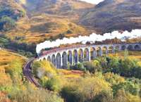 Black 5 No. 45407 leaves an attractive smoke trail as it crosses Glenfinnan Viaduct on 10 October 2012 with <I>The Jacobite</I> steam service to Mallaig.<br><br>[John Gray 10/10/2012]