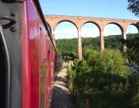 A North Yorkshire Moors service heading for Whitby, hauled by 75029 <i>The Green Knight</i>, approaching Larpool Viaduct on 4 September [see image 23574].<br><br>[John Steven 04/09/2012]