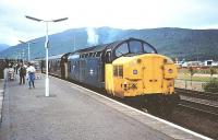 37112 with a train at Fort William in June 1983.<br><br>[Peter Todd 05/06/1983]