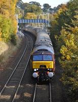 Nicely buffed-up 57601 leads the returning Inverness - Edinburgh - Rugby <I>'Lochs and Glens Statesman'</I> through Dalgety Bay on 21 October. 47826 brings up the rear.<br><br>[Bill Roberton 21/10/2012]