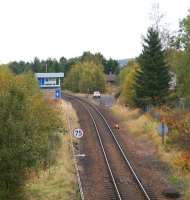 Looking north east towards Stanley Junction on 13 October 2012 with the line curving left towards Murthly. The former double track main line to Kinnaber Junction would have been where the signaller's car is parked in the middle of the picture. A house has been built on the trackbed beyond the car. [See image 7377]<br><br>[John McIntyre 13/10/2012]