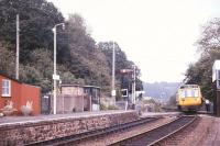 Signalman Billy Butt changes tokens at Eggesford on the Barnstaple Line  in July 1986.<br><br>[Ian Dinmore /07/1986]