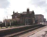 <I>'At Long Stanton I'll stand well clear of the doors no more.'</I> So goes the line in the evocative Flanders and Swann 1964 song 'Slow Train'. The closed station on the Cambridge - Huntingdon line is seen here in 1977. The route is now part of a guided busway [see image 35650]. [With thanks to Kenneth Leiper, David Prescott and Jim Petrie]. <br><br>[Ian Dinmore //1977]