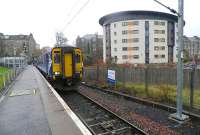 Scene at Paisley Canal on 7 November 2012, with a service to Glasgow Central ready to depart alongside one of the notices regarding the work currently underway on the electrification of the branch.<br><br>[John Yellowlees 07/11/2012]