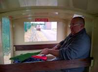 Room with a view: the guard on the narrow gauge train at the Chasewater Railway inspects his flags. The staff here kindly ran a special train for us after we dallied too long on the standard gauge.<br><br>[Ken Strachan 16/09/2012]