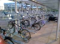 The latest thing in transport integration is this 2-level bike park outside Milton Keynes station. Well, I hadn't seen one before.<br><br>[Ken Strachan 11/09/2012]