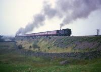 Train locomotive and banker both working hard climbing Shap in the 1960s.<br><br>[Robin Barbour Collection (Courtesy Bruce McCartney) //]