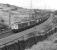 76012 and 76007 had been in action earlier on 17 July 1981 undertaking banking duties from Wombwell Main Junction. Later they had run light to Penistone to pick up a coal train from Barnsley Junction. The locomotives are seen here with the train approaching Dunford Bridge.<br><br>[Bill Jamieson 17/07/1981]