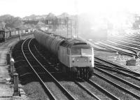 47368 succeeds in obliterating most of York's Dringhouses Yard in July 1980 as it passes on the way south with an oil train.<br><br>[John Furnevel 22/07/1980]