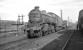 Looking east along the elevated Chaytor's Bank sidings at Gateshead in the late 50s/early 60s. The old roundhouse (later paintshop) stands in the right background with the main shed over to the left. K1 2-6-0 no 62026 of Blaydon shed is at the head of the lineup with a J72 and a pair of type 2 diesels for company.<br><br>[K A Gray //]