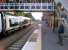 Looking South at Kidderminster on a Saturday evening in September 2012. The class 172, the station footbridge and the colour light signals are all quite new. The chap on the right still doesn't seem too impressed.<br><br>[Ken Strachan 22/09/2012]