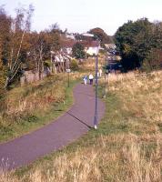 The alignment of the new Borders Railway, looking north over the site of the future Eskbank station on 9th October 2012. As in many places along the route corridor, the existing railway path will have to be diverted to an alternative on-road alignment - the only locations where the (single-track) railway will share the future solum with a walking / cycling path will be around Galashiels, including the 'Red Bridge' over the River Tweed.<br><br>[David Spaven 09/10/2012]