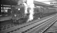 Rebuilt Bulleid 'West Country' Pacific no 34036 <I>Westward Ho!</I> with an up express waiting to leave Exeter St Davids on 5 October 1961.<br><br>[K A Gray 05/10/1961]