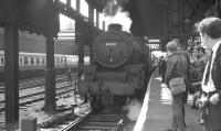 Platform scene at Manchester Victoria on 9 June 1968 with Black 5 no 45350 assisting with the stock of the BR (LMR) <I>'Midland Line Centenary Special Railtour'</I>. During a two hour stopover at Victoria a short DMU tour had been arranged for participants to Manchester Piccadilly and back. The special later left for Nottingham Midland behind 70013 'Oliver Cromwell' [see image 32850]. [With thanks to Vic Smith, John Robin and Douglas Corrigan]<br><br>[K A Gray 09/06/1968]