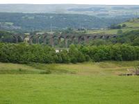 The Hewenden Viaduct between Keighley and Queensbury on the former Keighley to Bradford & Halifax line as seen from the A644 Halifax to Keighley Road on the outskirts of Denholme <br><br>[David Pesterfield /07/2012]