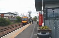 A quiet period at Alloa station on 9 May 2012. The train is the 12.36 departure for Glasgow Queen Street.<br><br>[John Furnevel /05/2012]