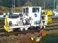 Track machine in the PW sidings alongside Crianlarich station on 23 November 2012. <br><br>[Brian Smith 23/11/2012]