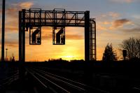 The east end signal gantry at Didcot in the early morning sun on 4 December 2012.<br><br>[Peter Todd 04/12/2012]